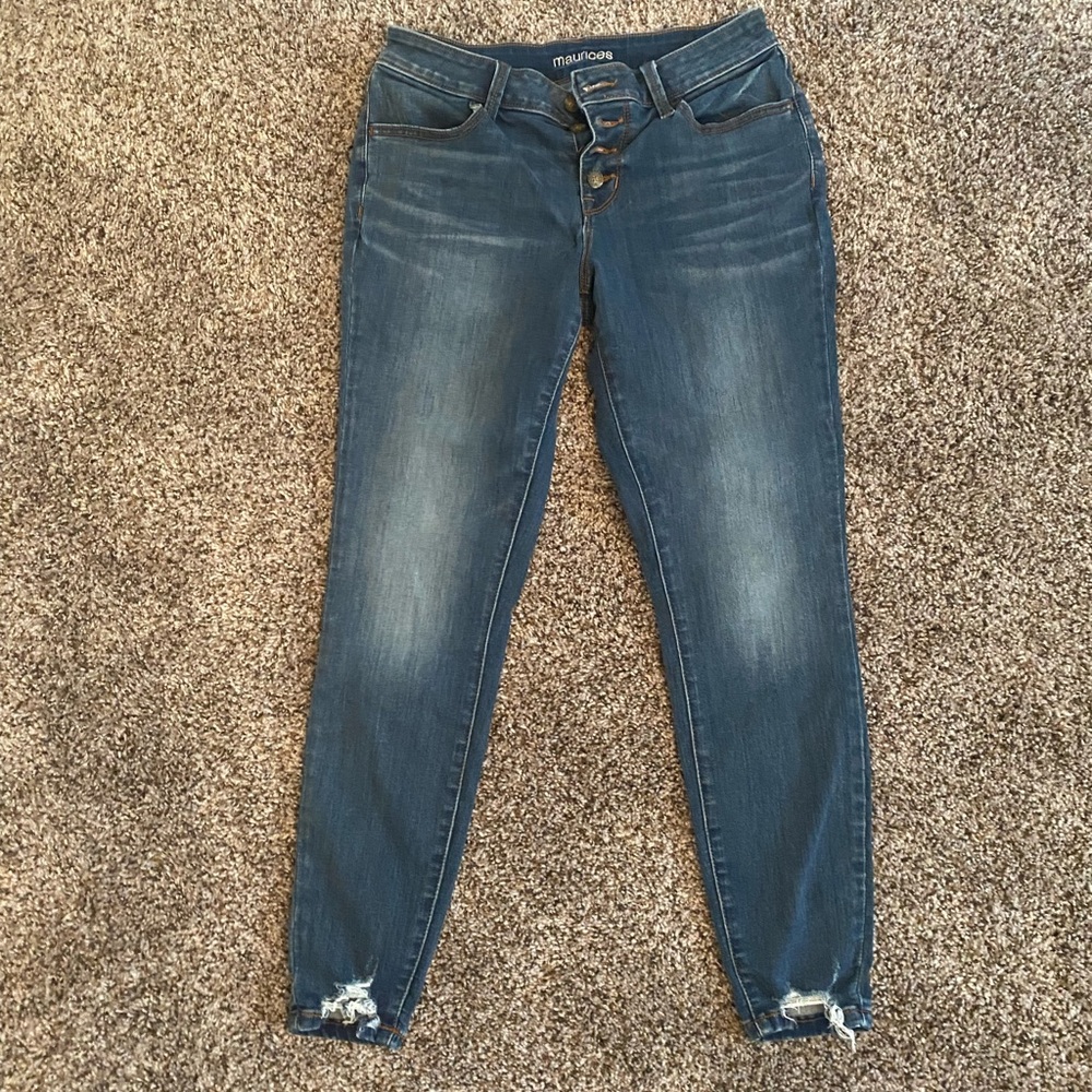 Women’s distressed button fly jeans
